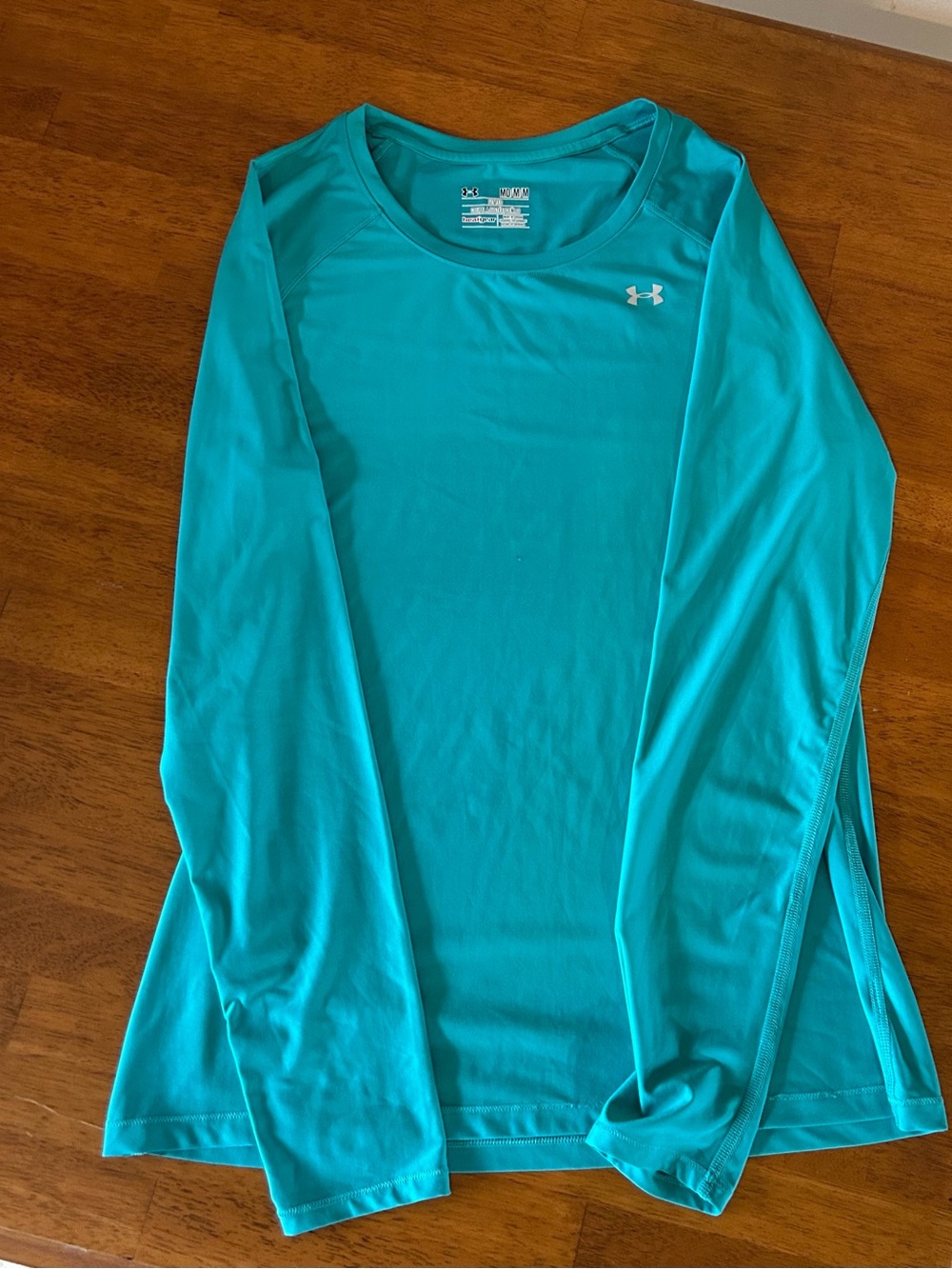 3 Heat Gear Under Armour Women's Shirts